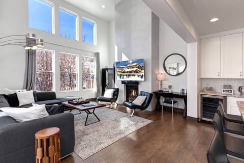 Retreat at Jordanelle 1157: Living/gathering area with tone of light, TV, fireplace and desk