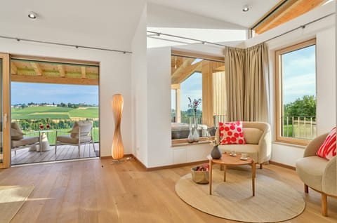 Luxury Double Room | Living area | Flat-screen TV