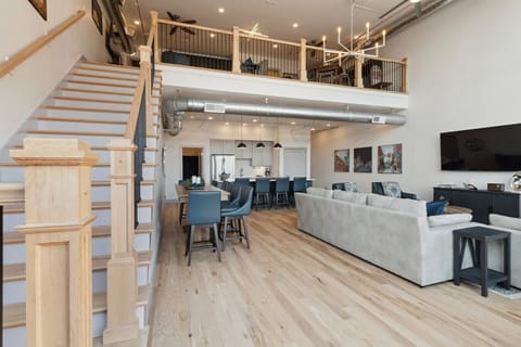 Open concept floor plan with an additional living space and 2 bedrooms off of the Mezzanine