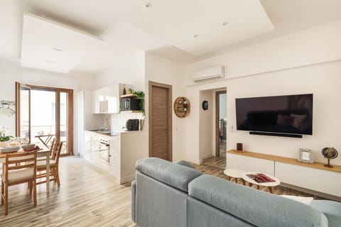City Apartment, 2 Bedrooms, City View | Living area | 32-inch flat-screen TV with digital channels