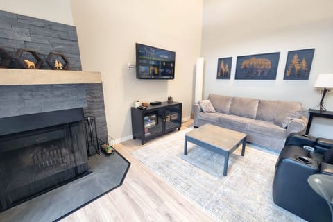 Relax in the reclining chair or comfy couch. Cable tv and internet available.