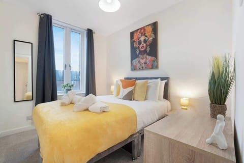 Bedroom 2 benefits from a comfortable double-sized bed with plenty of storage. 