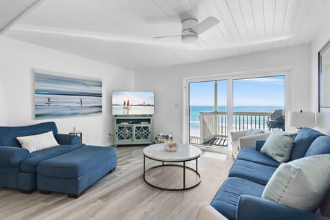 This 3-Level, Beachfront Townhome w/ a Private Beach features Gulf & Beach Views from 3 Patios, 2 KING Bedrooms, the Living Space and comes Fully-Stocked with beach gear, arcade game, & more!
