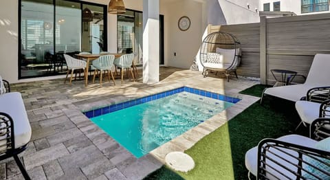 Enjoy your own private oasis with a pool designed for both relaxation and recreation, just steps from your door.