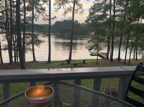 Serene lake view including one of the two private lake docks on property. 
