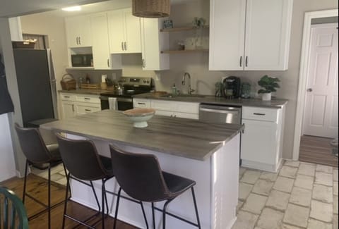 Large kitchen with new appliances. 