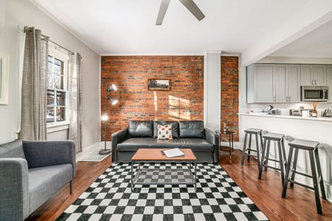 Living area features a sofa bed.
