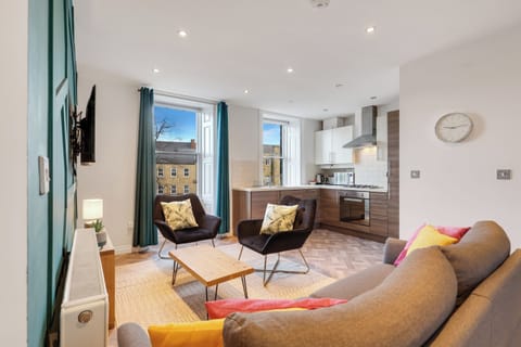 Apartment, City View | Living area | 29-inch TV with satellite channels