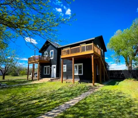Escape to this stylish modern farmhouse featuring open green space, private decks, and bright interiors. Perfect for families, groups, and nature lovers, with plenty of room to relax and unwind. Just minutes from local restaurants and attractions.