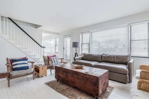 Bold pillows, natural textures, and a coffee table with stories to tell.