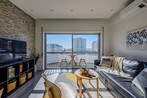 Apartment, 1 Bedroom, Pool Access, Sea View | Living room