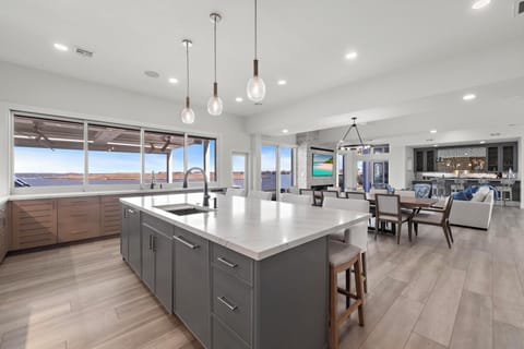 
Main house kitchen opens to living area and outdoor dining area