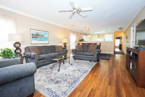 Open-concept layout keeps everyone connected—bright, airy, and ideal for group stays.