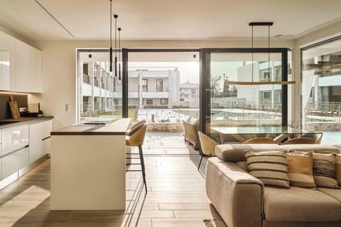 Luxury Condo, 2 Bedrooms, Kitchen, Pool View | Living area | 65-inch Smart TV with satellite channels, Netflix, streaming services