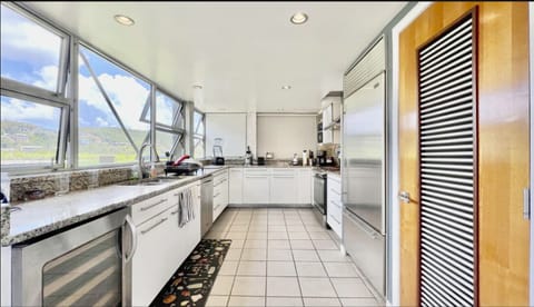 Spacious, well-equipped kitchen with Sub-Zero fridge.