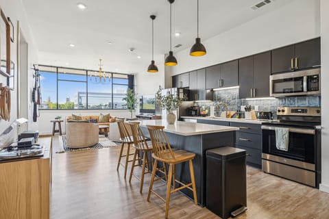 Luxury Condo, Balcony, City View | Private kitchen | Full-size fridge, microwave, oven, stovetop