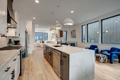 Discover this stylish downtown Nashville oasis, blending modern elegance with comfort. Ideal for large groups, it boasts a chic kitchen and spacious living area—perfect for bachelorette parties or family reunions in the heart of Music City.