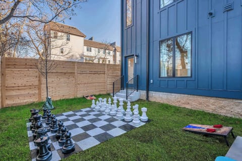 Challenge friends to life-sized chess in this stylish outdoor space at a luxury Nashville vacation rental. Perfect for groups, enjoy fresh air and the vibrant Music City vibe while making memories together!