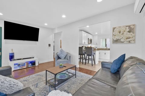 Spacious living room with queen-size sofa bed and Xbox entertainment