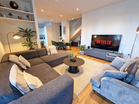 Settle into the plush sofa, fire up the Smart TV and catch your favourite shows after a day exploring Manchester