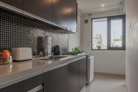 Apartment | Private kitchen | Full-size fridge, microwave, oven, stovetop