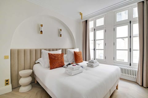 Apartment | Laptop workspace, iron/ironing board, bed sheets