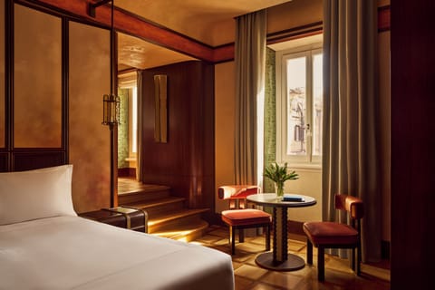 Deluxe Room, 1 King Bed | Minibar, in-room safe, soundproofing, iron/ironing board