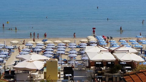 Private beach nearby, white sand, sun loungers, beach umbrellas
