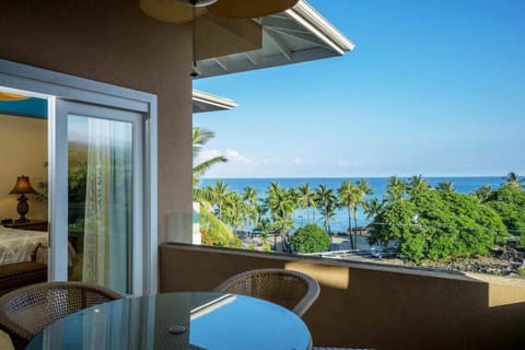 Lanai with table and ocean view
