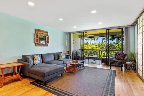Cozy and spacious living area with TV