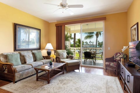 Golf course front living room with cable TV, DVD player and lanai access