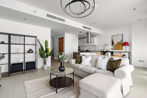 Grand Apartment, 1 King Bed | Living area | 50-inch Smart TV with digital channels