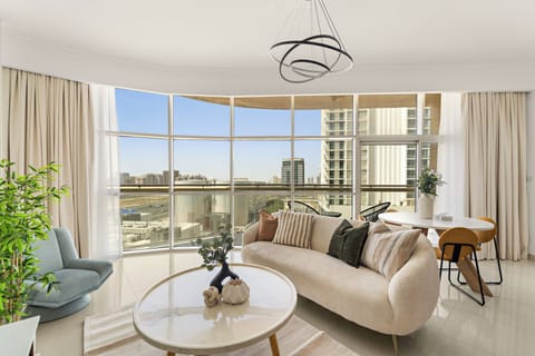 Premier Apartment, 1 King Bed | Living area | 50-inch Smart TV with digital channels