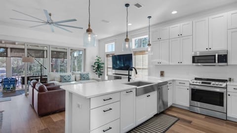 Kitchen: Drip coffee maker, Keurig, blender, toaster oven, waffle maker, cooking utensils, tableware