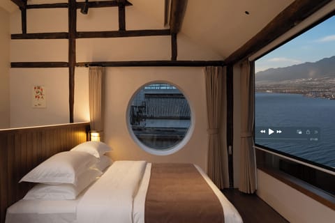 Deluxe Single Room, 1 King Bed, Private Bathroom, Garden View | Minibar (free items), desk, laptop workspace, blackout drapes