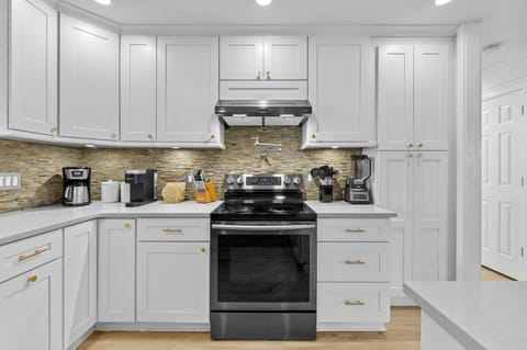 Featuring ample cabinetry and high-end appliances.