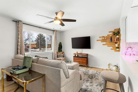 Comfortable Living Space with Smart TV, Flooded with Natural Light