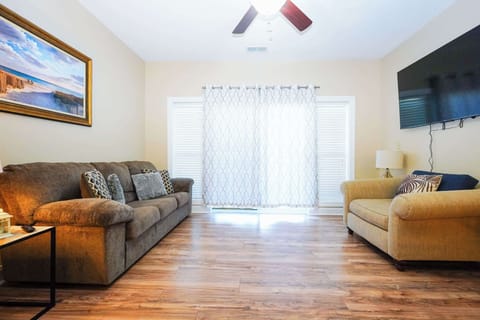 Bright, comfortable living space with easy patio access.