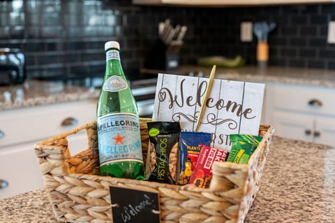 Thoughtful welcome basket w/ snacks & drinks to start your stay on a warm note