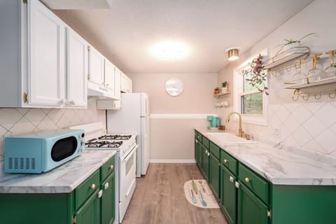 Clean and bright kitchen with all of the necessities. New ceramic pots and pans,  farm fresh eggs, local beer and chips.