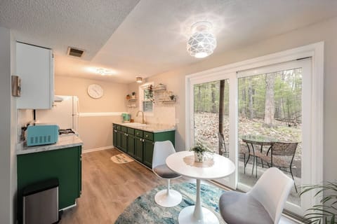 Plenty of character! From the light fixtures, to the gold accents and tulip table.