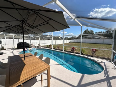 Backyard and covered pool area