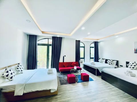 Family Shared Dormitory, Balcony, Garden View | Individually decorated, desk, iron/ironing board
