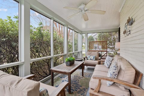 This home has an outdoor, fully screened in porch to enjoy the weather without the bugs!