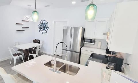 Townhome, Multiple Beds, Kitchen, Garden View (Villas de Laguna 1) | Private kitchen | Fridge, microwave, oven, stovetop