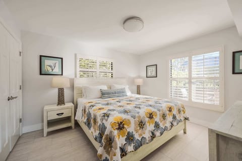 Beautiful Bedrooom with King size bed and natural light; Two nightstand and dresser
