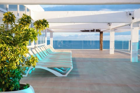 Indoor pool, seasonal outdoor pool, pool umbrellas, sun loungers