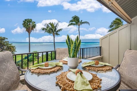 Enjoy your morning coffee or evening cocktails on this spacious lanai overlooking the sparkling blue waters