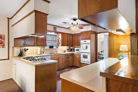 Kitchen Delight: Prepare delicious meals in this bright, stylish kitchen with ample space!