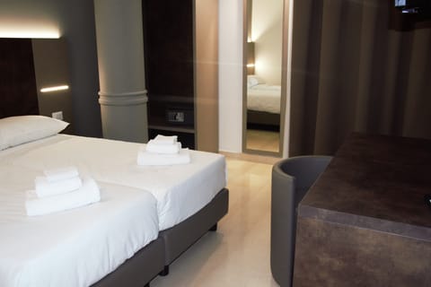 Economy Double Room, City View | In-room safe, desk, laptop workspace, blackout drapes